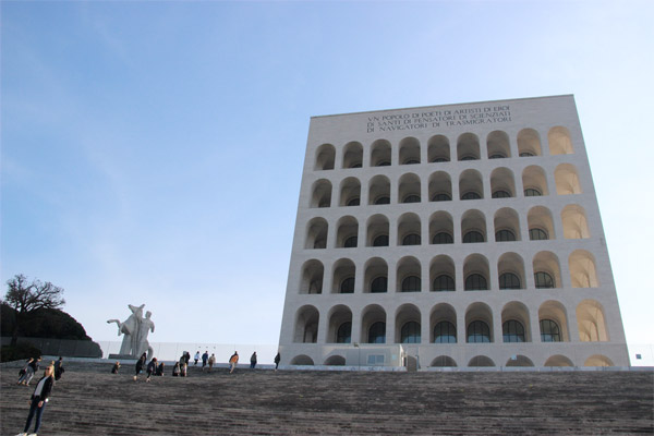Examine famous buildings and urban spaces such as the <b>Bassorilievo Palazzo Uffici</b> (the first building to be completed in this new district in 1939), <b>Palazzo della Civiltà Italiana (the Square Colosseum)</b> synonymous with EUR and this period in general, and <b>Via Cristoforo Colombo</b>, the street that links Ostia to the historic center. Structures that are so unique, they stand out from the rest of Rome.